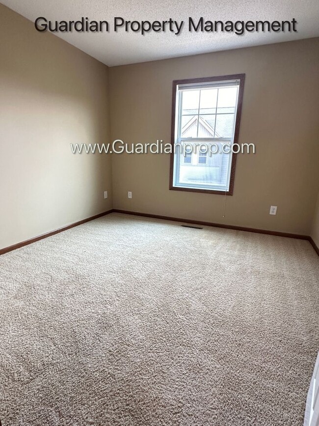 Building Photo - Pet Free Champlin Town Home, 3.5 Baths, 2 Car Garage, Dishwasher, Balcony, Available end of April
