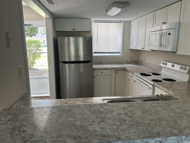 Building Photo - 6850 King Arthur Dr