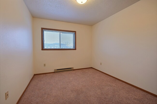 Fargo, ND Village West Apartments | Bedroom - Village West