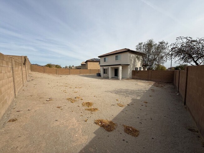 Building Photo - Buckeye, 4 bed, 2.5 bath, huge lot, across...