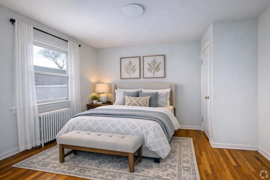 1BR, 1BA - 648SF - Living Room - Virtually Staged - Elmwood Terrace Apartments