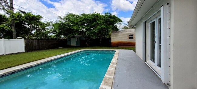Building Photo - 3/2 with pool and outside