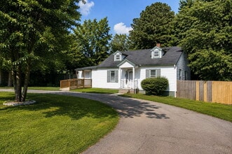 Building Photo - Updated Multi-Bedroom Home | Brand-New Deck | Circular Drive | Triad Premier Realty