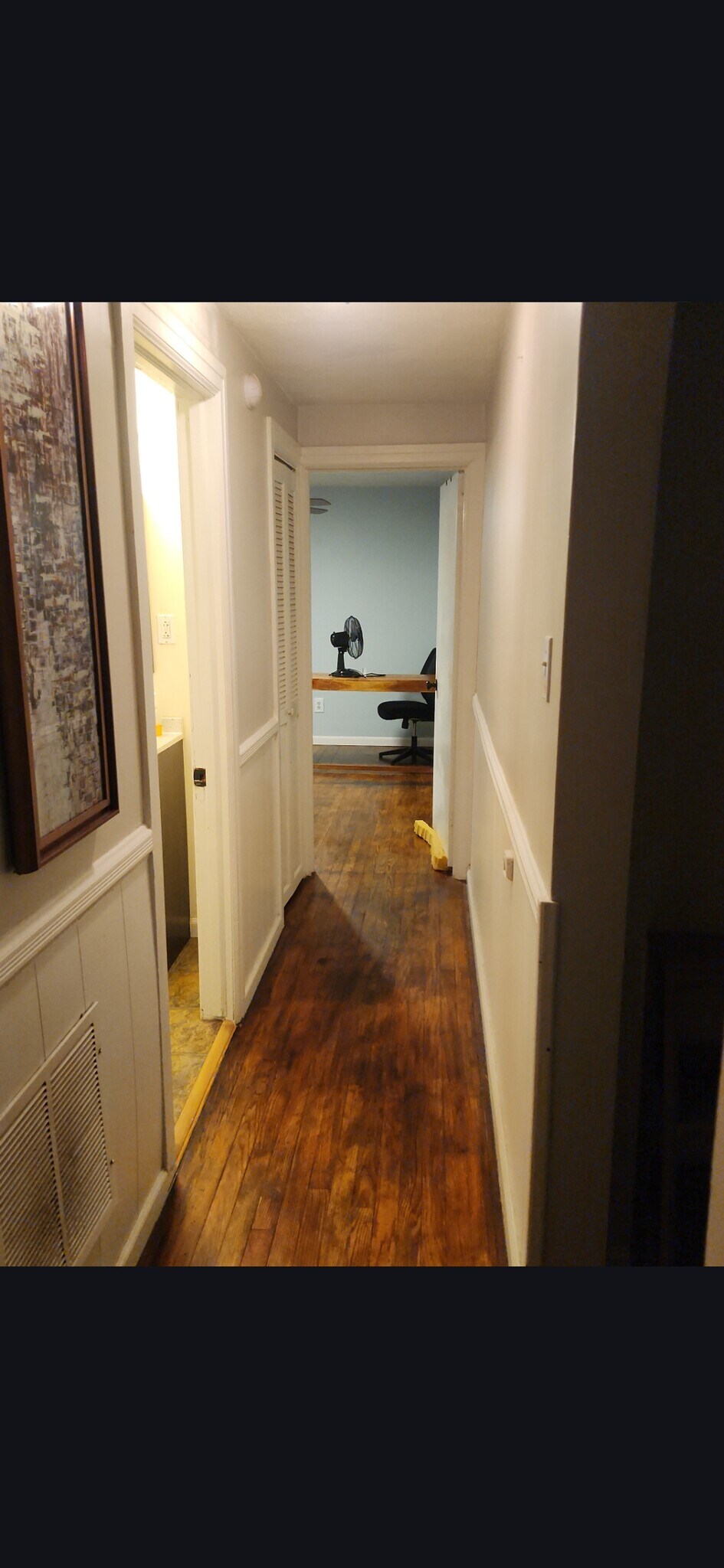 Hallway between two bedrooms w\ bath in center - 319 Clymer Ave