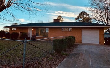 Building Photo - Bright 4BR Home with Fenced Yard, Hardwood Floors & Garage on Rankin St