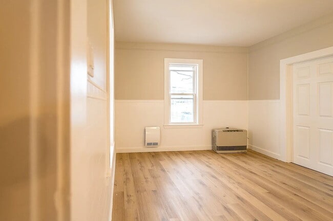 Building Photo - PRICE IMPROVEMENT! + Washer and Dryer INCLUDED in This Beautiful 2-Bedroom Apartment – Quiet, Pri...