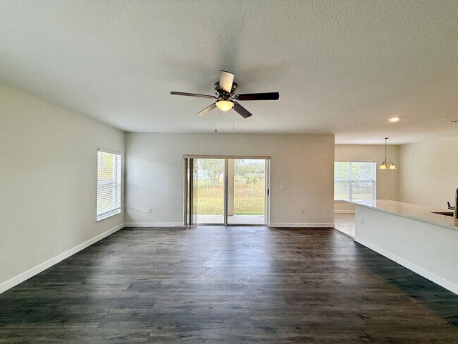 Building Photo - GORGEOUS, Large Completely Renovated Two-Story 4/2.5 PLUS LOFT in POINCIANA VILLAGES!
