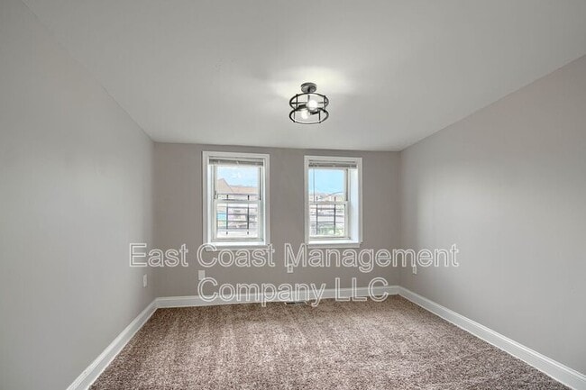 Building Photo - 1527 N Stricker St