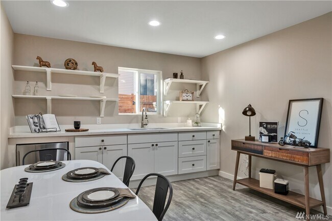 Kitchen area w/ 2 burner electric hot plate (provided) - 11837 32nd Ave NE