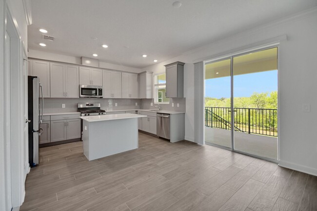 Building Photo - Stunning 4/3 in Gated Dora Parc! Water Views!