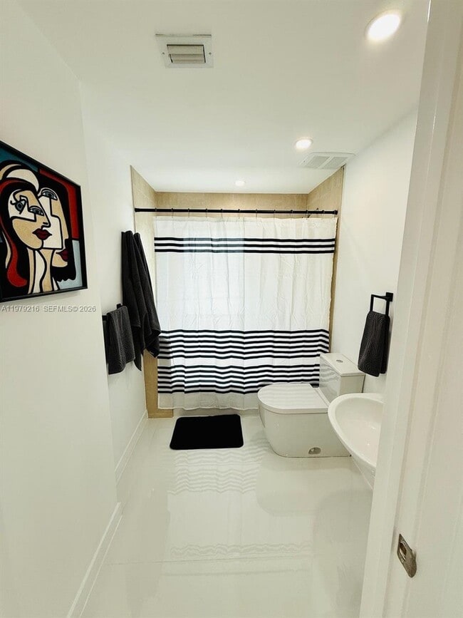 Building Photo - 7700 Collins Ave