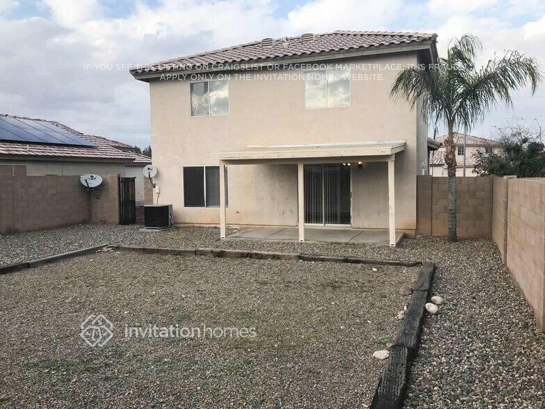 Building Photo - 12833 W Paradise Dr