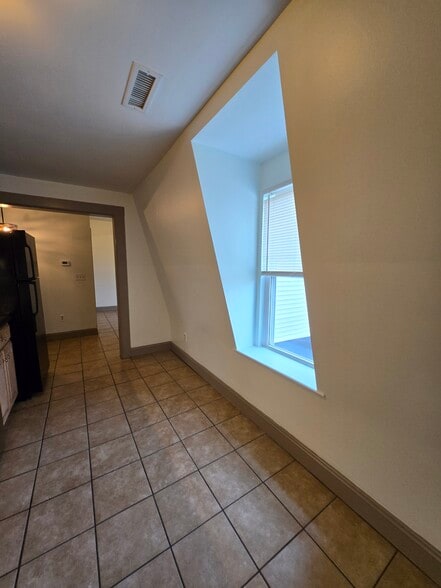 Midpoint kitchen looking towards dining room - 127 Pearl St