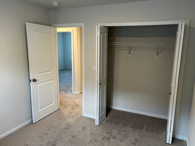 Building Photo - New Construction! Four Bedroom Home in Woo...
