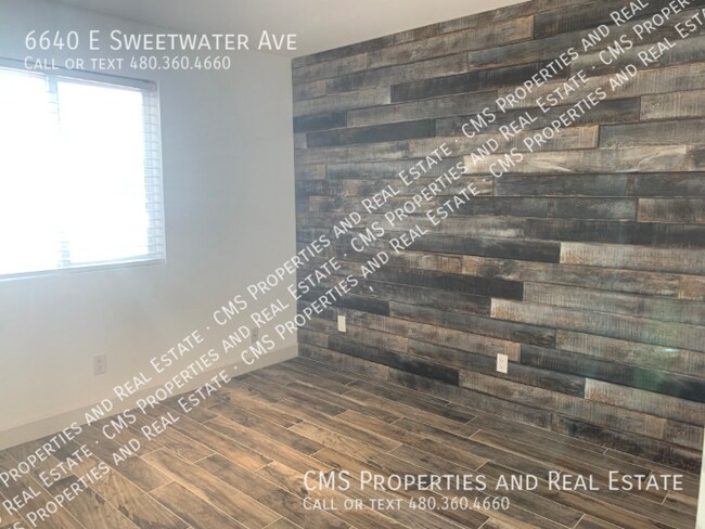 Building Photo - 6640 E Sweetwater Ave