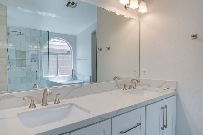 Building Photo - Comfort and Style in a Secure Gated Community: Stylish 4-Bedroom Single-Story Home