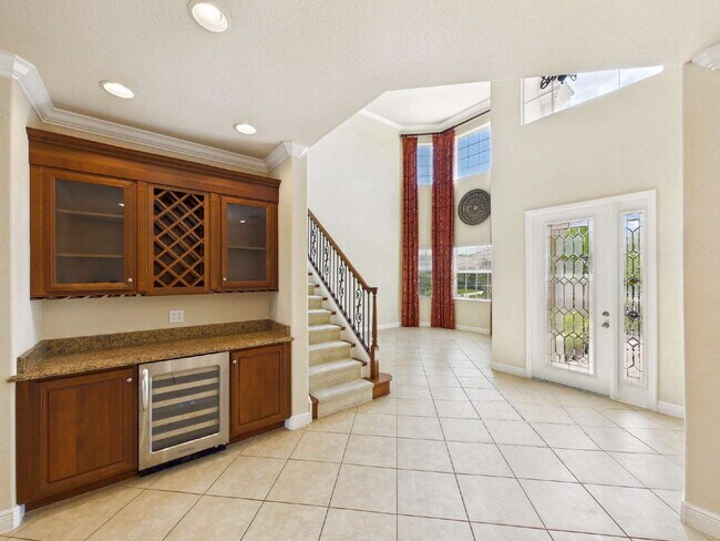 Building Photo - Luxury Lakefront Pool Home in Tesoro - Move-in Ready with Premium Inlcusions