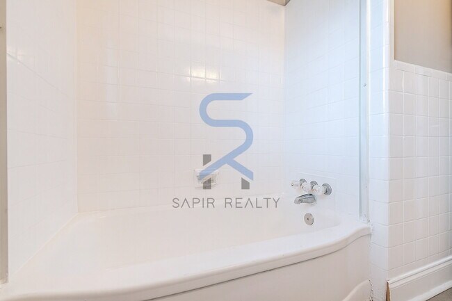 Building Photo - Move in before December 31st and choose your reward: a $250 Amazon Gift Card or a 55" Smart TV!