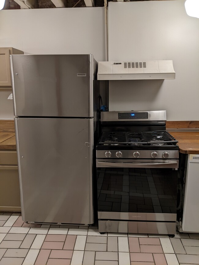 New refrigerator and gas stove - 11 Spruce St