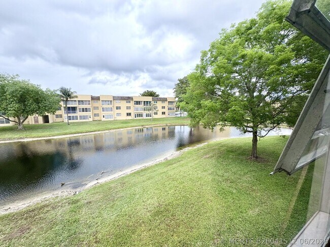 Building Photo - 6070 NW 64th Ave
