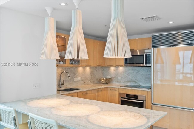 Building Photo - 6899 Collins Ave