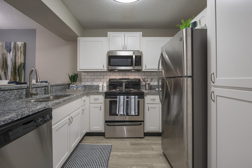 Kitchen with stainless steel appliances - Saddleworth Green