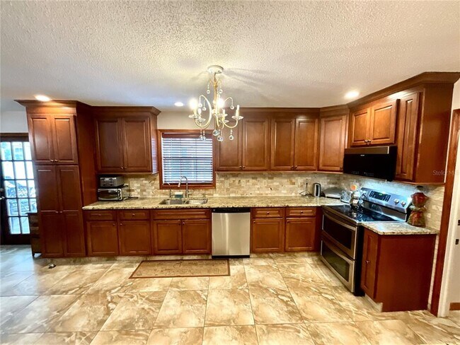 Building Photo - 8834 Whispering Oaks Trail