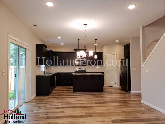 Building Photo - Spacious & Stylish 4-Bedroom Home with Mod...