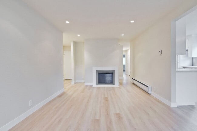 Building Photo - Refreshed 2/2 Second Floor Campbell Condominium in Great Location! Attached Garage & Additional S...