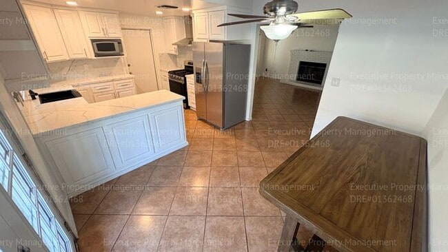 Building Photo - 3 bedroom 2 bathroom home on a corner lot with extra fenced parking.