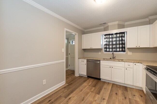 Building Photo - Fully Renovated 2BR Townhome-Style Condo – Available Now!