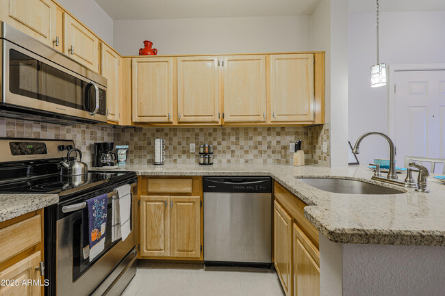 Building Photo - 14950 W Mountain View Blvd