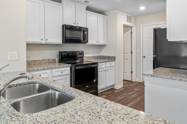 Building Photo - Modern Comfort Meets Outdoor Adventure – Stunning 1-Story Home Near Downtown Greensboro!