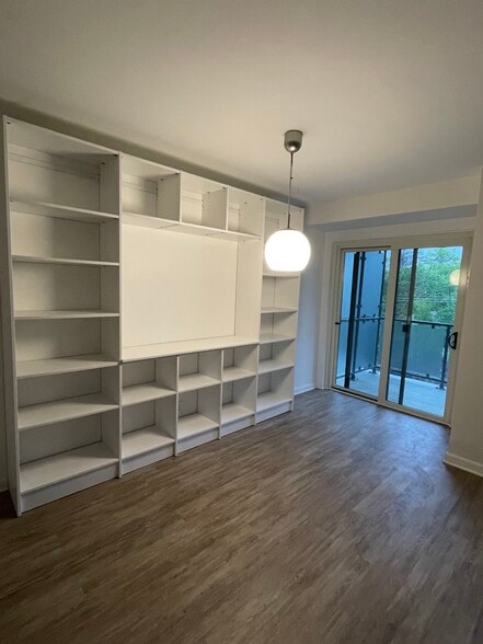 Floor to ceiling shelving - 4201 Cathedral Ave NW