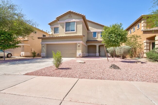 Building Photo - 4 Bedroom in Tolleson.  Landscaping redone.  Newer Carpet, Available February 1st!!!  Great 2 sto...