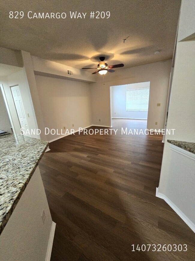 Building Photo - Wonderfully renovated 2nd floor condo in a...