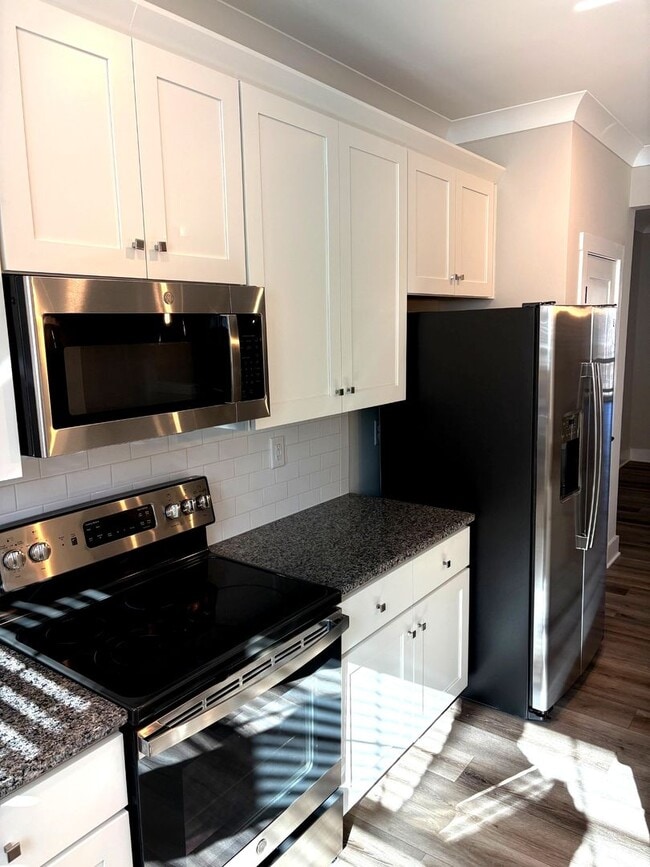 Building Photo - Completely NEW! 3BR w/ 2-Car Garage + Balcony