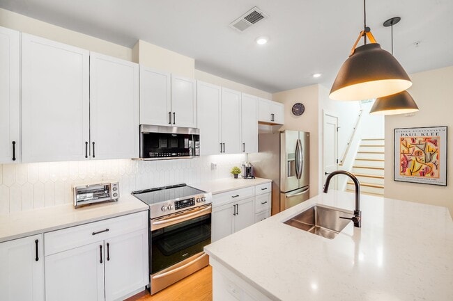 Building Photo - Chic Fully Furnished Condo with Private Retreat-Style Primary Suite