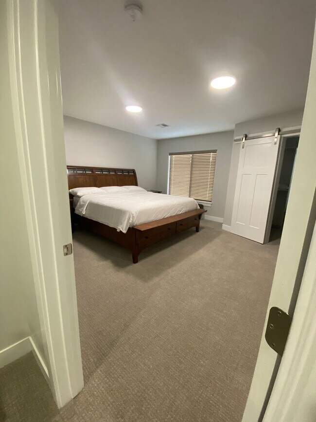 Building Photo - Fully Furnished  2BR, 2.5 Bathroom Townhome With attached 2 car Garage