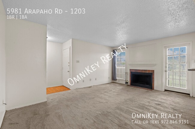 Building Photo - 5981 Arapaho Rd
