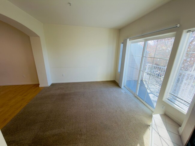 Building Photo - Gorgeous Tri-Level Condo at Progress Ridge — Lake Views!