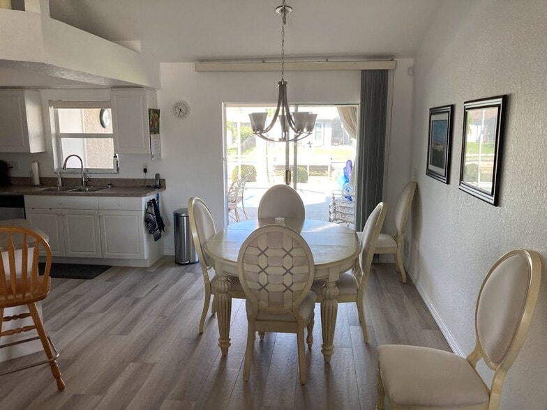 Building Photo - Short term FULLY FURNISHED vacation rental ,3/2 Pool Home on canal