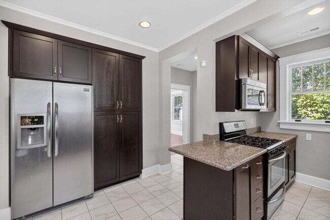 Building Photo - Historic Charleston Charm, Reimagined for Modern Living