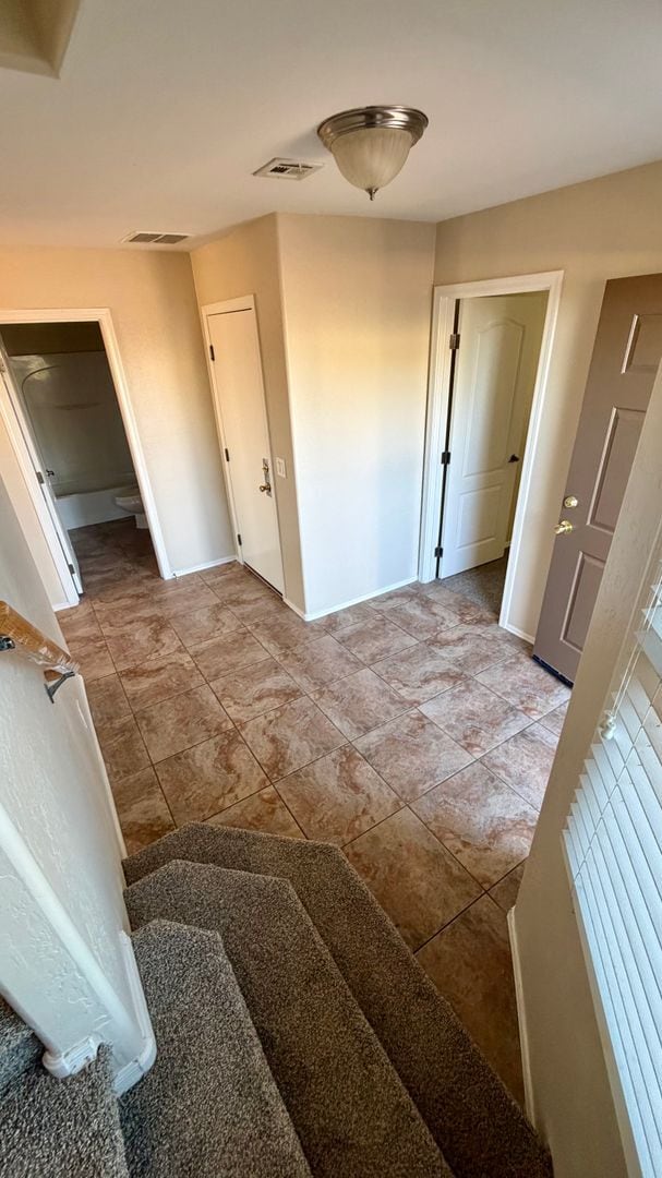 Building Photo - Spacious Surprise home with large backyard