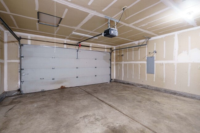 Building Photo - Recently Updated with Wood Laminate Flooring and Fresh Paint