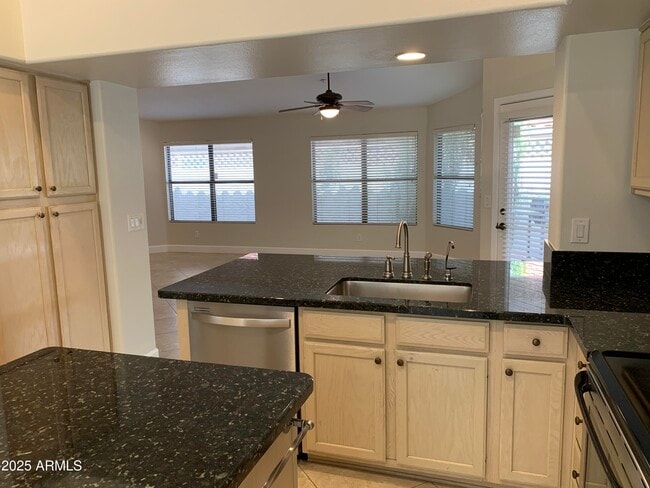 Building Photo - 8889 E Aster Dr