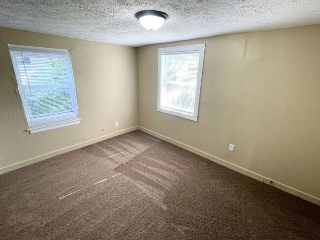 Building Photo - 2 Bedroom with open-concept living areas