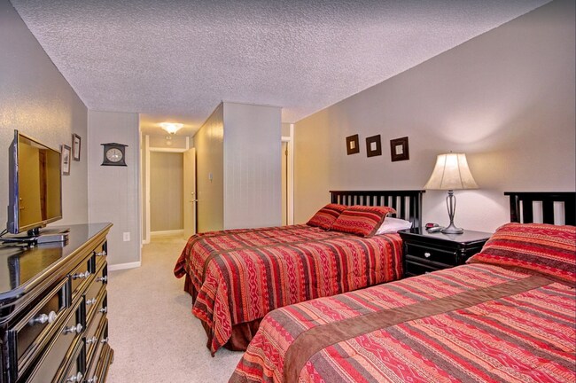 Primary Photo - Mountain side condo! Hot tub! Underground ...