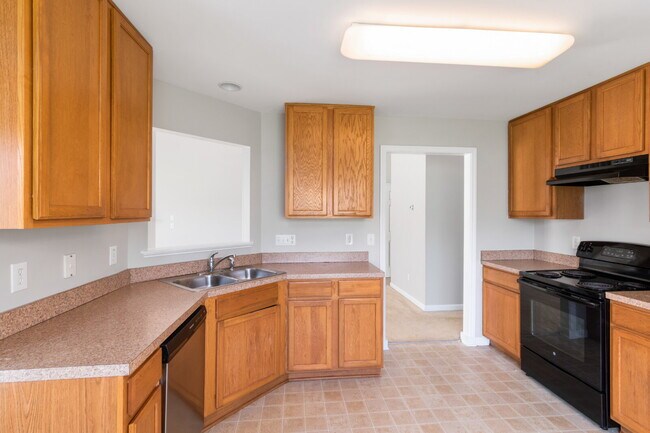 Building Photo - Spacious 4BR/3BA Home Near Downtown Durham | Deposit-Free Living | 1st-Floor Bedrooms