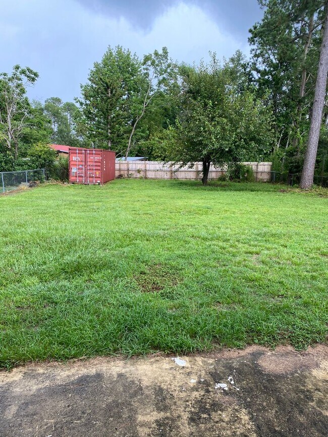 Building Photo - COMING SOON! 4Br, 2.5 baths, large kitchen, large bedrooms, fence, storage and more! N. College R...